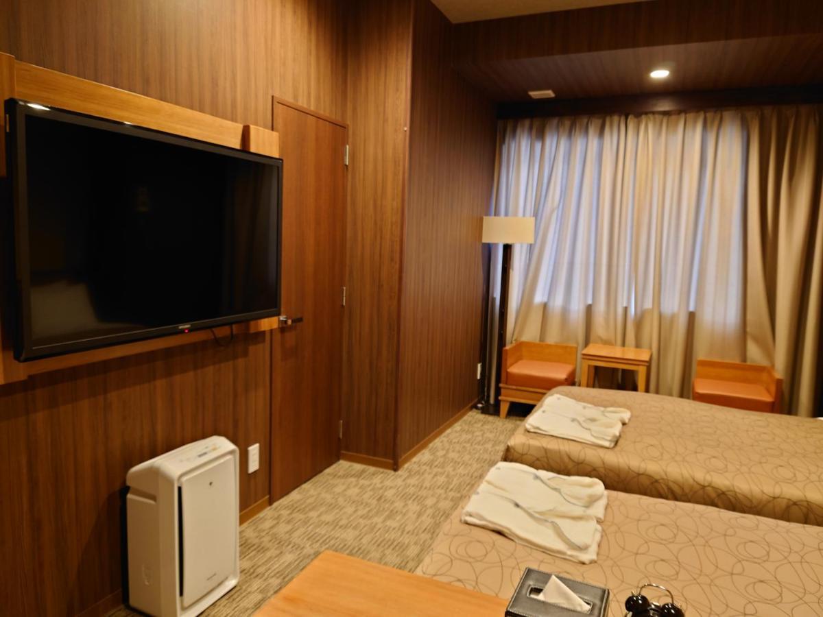 HOTEL RELIEF Sapporo Susukino Esterno foto
