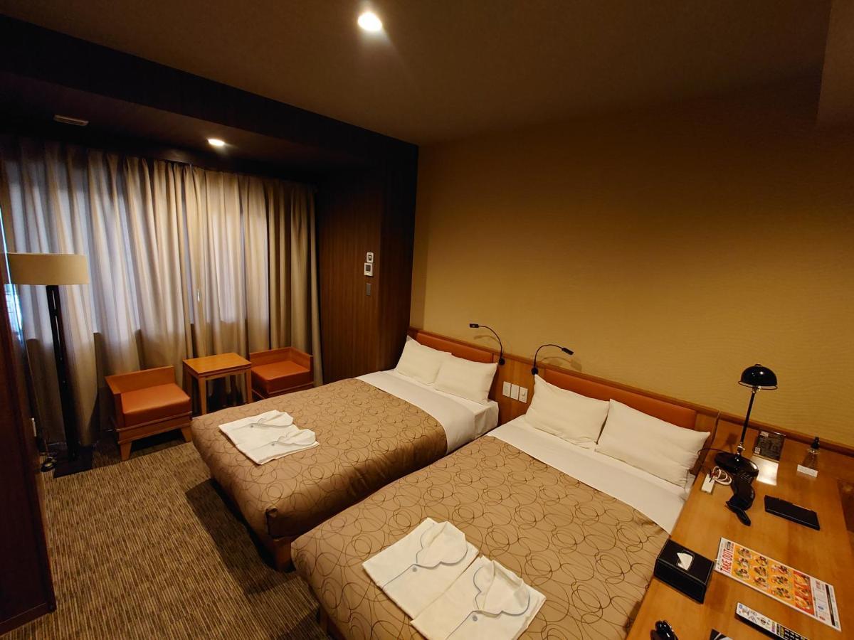 HOTEL RELIEF Sapporo Susukino Esterno foto